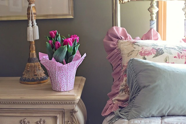 floral bring pillow case on metal grandmacore style bed