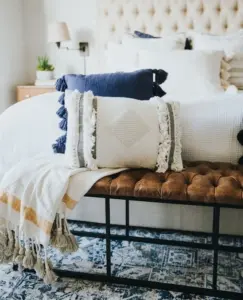 too much pillow is a bedroom design mistake and create a clutter look