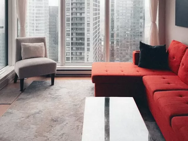 Unexpected red sofa in a living room