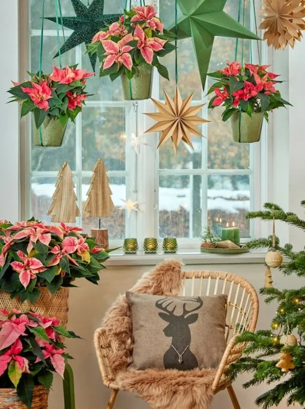 Decorate a small space for the holidays using vertical space hanging ornament from ceiling