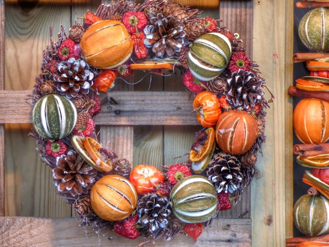 wreath with dried mini pumpkins and pinecone